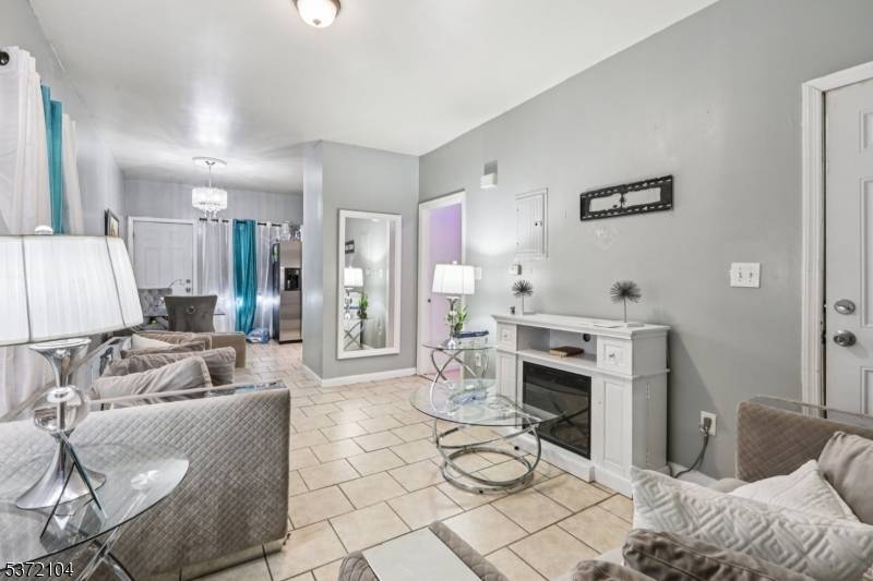 Perfect for investors or first time homebuyers, this well maintained 2 family home offers solid rental income potential and long term value.