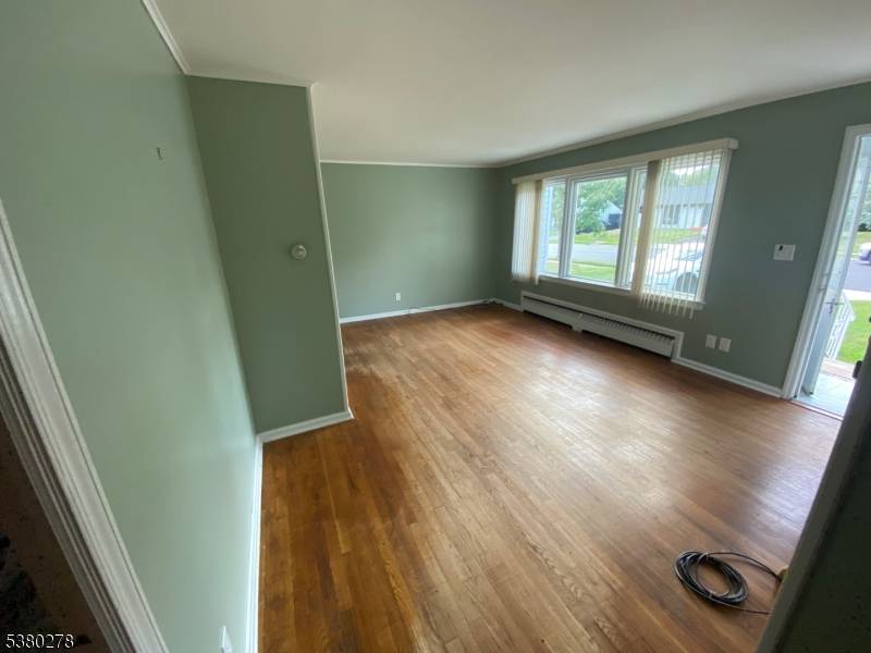Welcome to this hidden gem in the heart of highly desirable Clark, New Jersey !