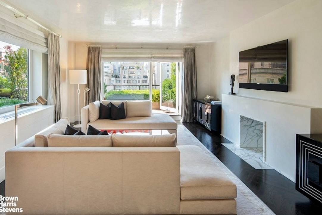 Elegant Duplex with Wrap Terrace Off Fifth Avenue This mint condition quiet, corner two bedroom, 2.