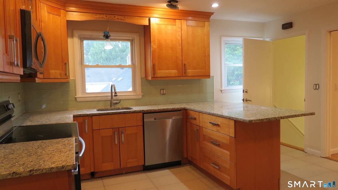 IT'S A BARGAIN ! ! This charming, bright three bedroom, one bath property boasts more than its convenient location.