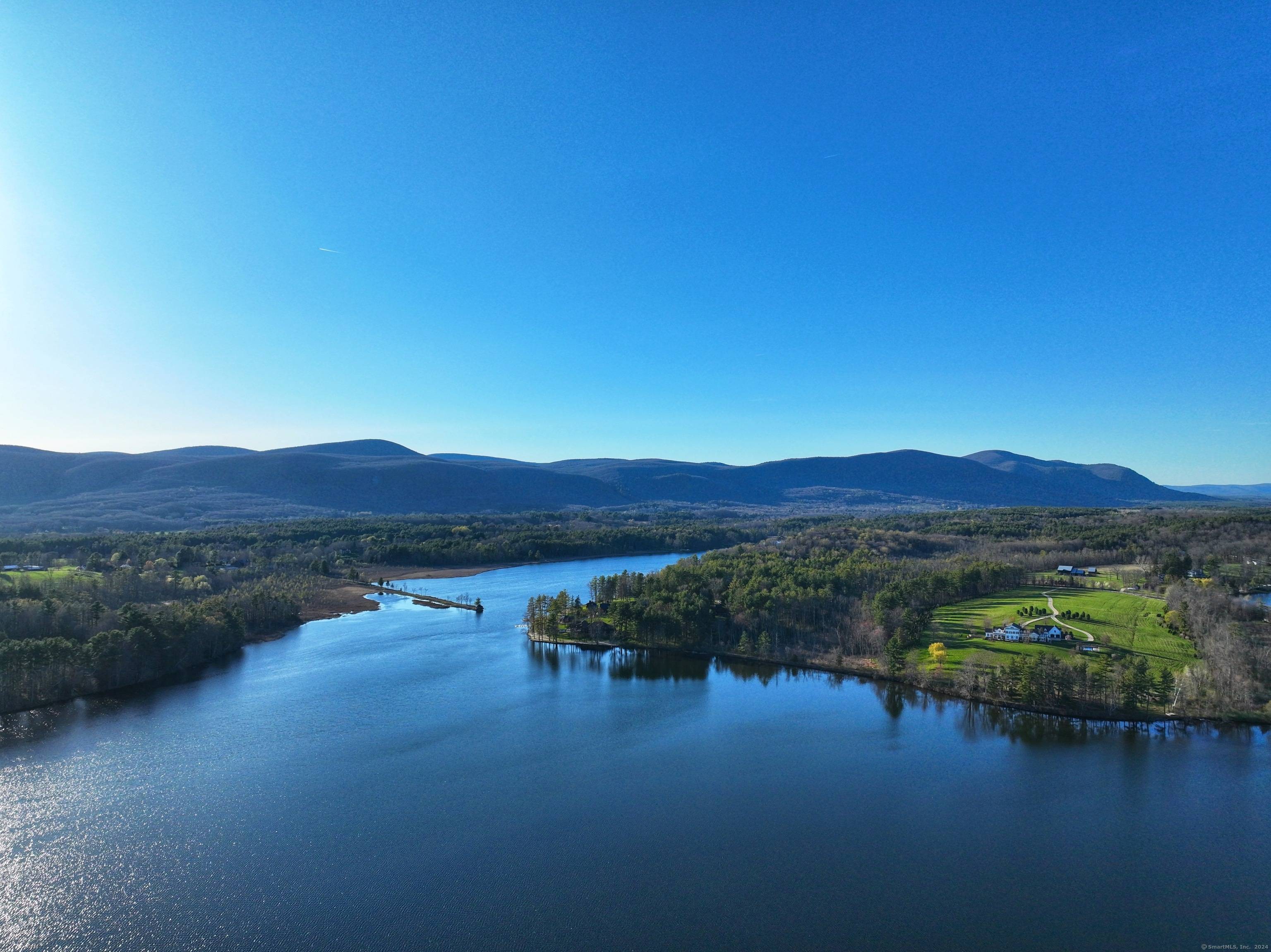 An opportunity to own a Litchfield County estate property with over 1, 300' of direct waterfront on tranquil undeveloped 242 acre Winchester Lake minutes from historic 18th Century Winchester Center.