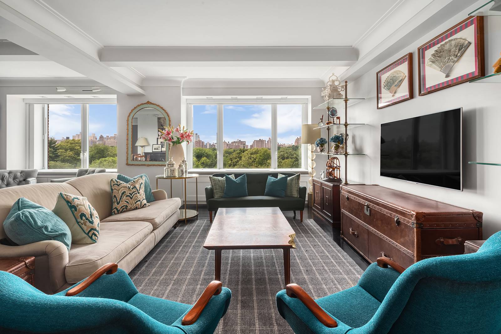 Overlooking Central Park with iconic, unobstructed views, this elegant three bedroom, three and a half bathroom home spans over 2, 389 sq.