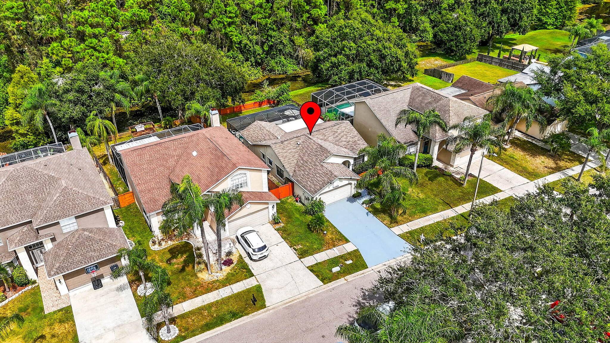 MOTIVATED SELLER ! A gorgeous private screened pool property that features 3 Bed, 2 Bath and 2 car garage.