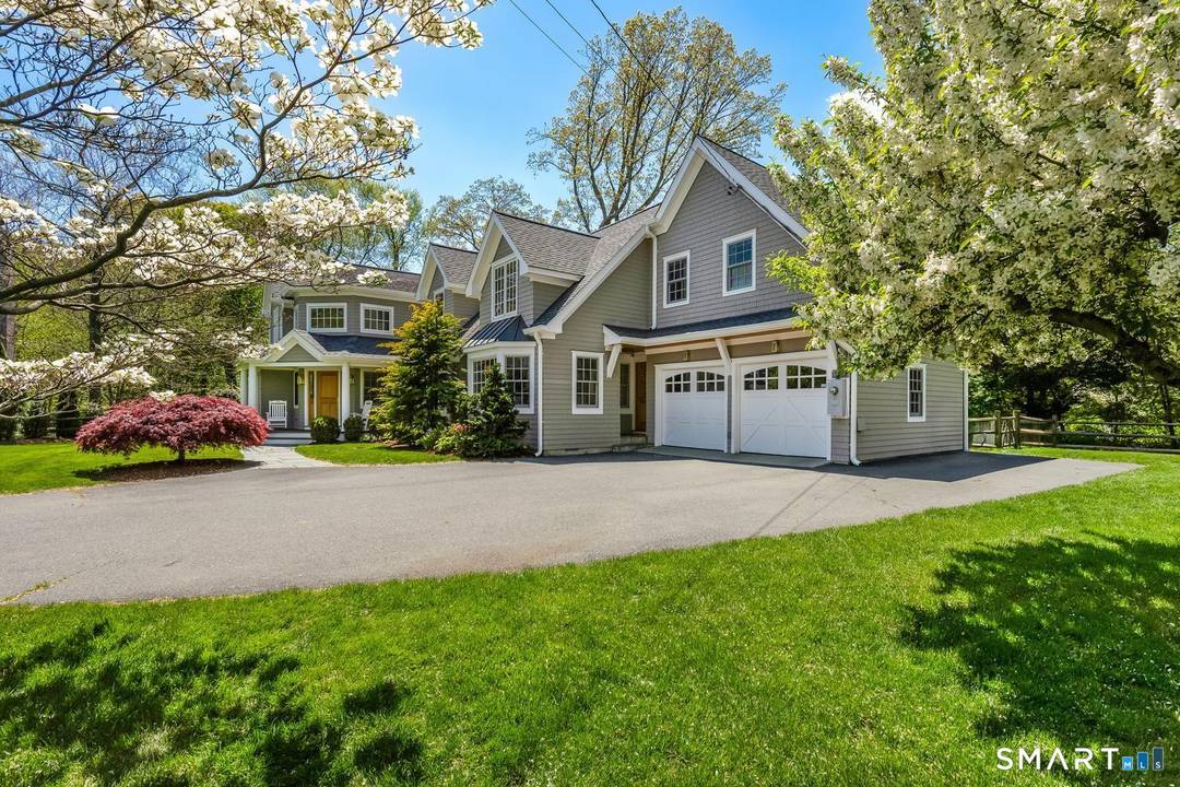 18 Phillips Lane offers a rare combination of neighborhood energy and privacy, set on one of Darien's most sought after cul de sacs.