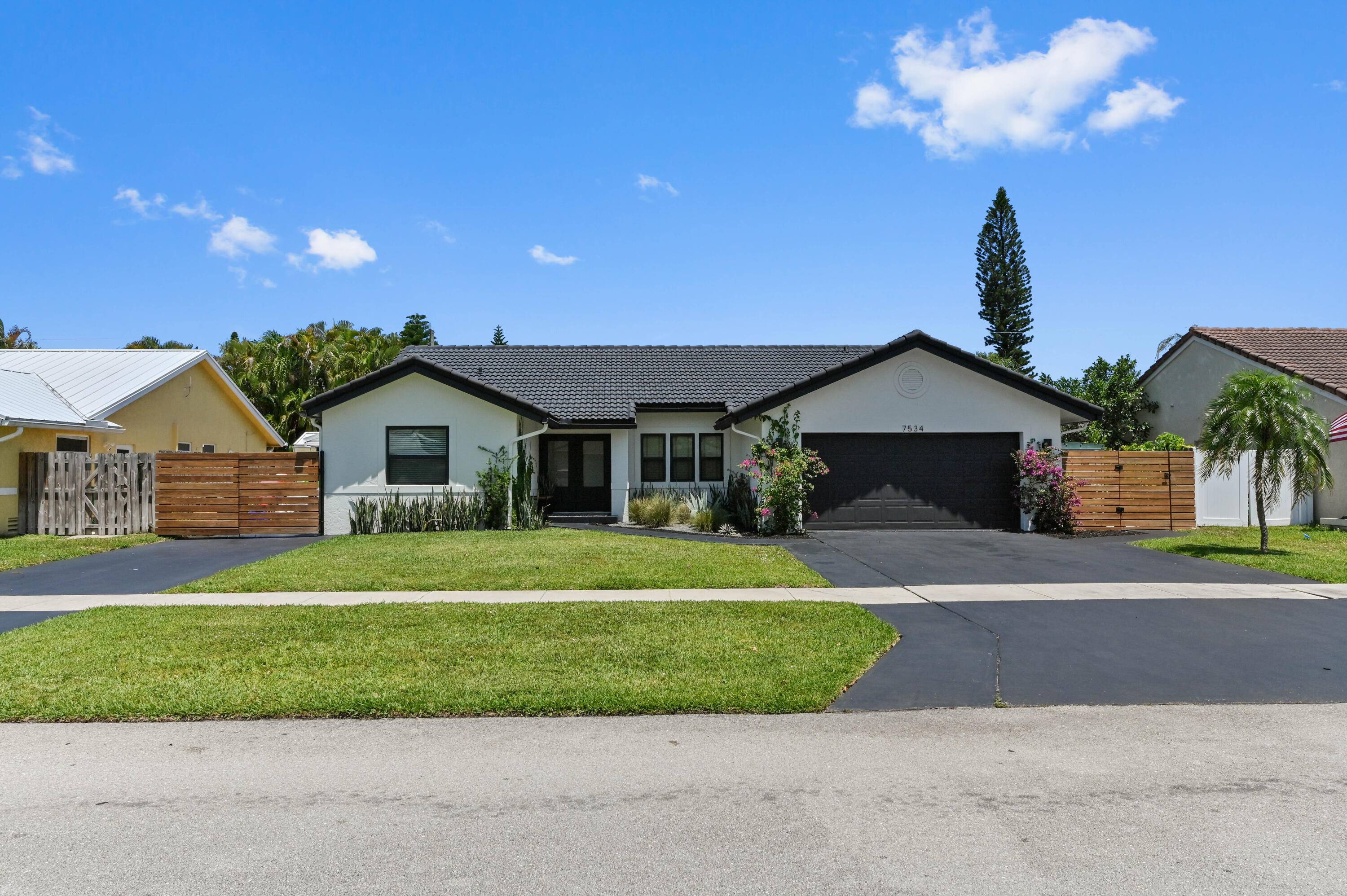 Beautifully renovated home in the highly sought after Hidden Valley subdivision in East Boca.