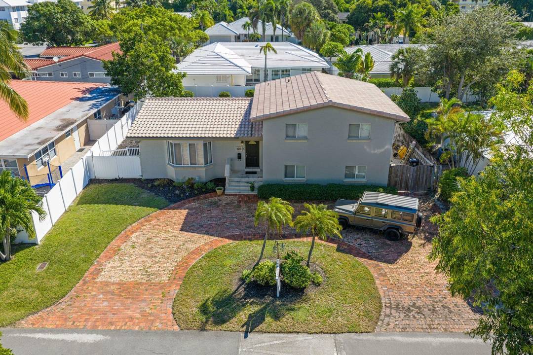 Situated in the heart of the highly sought after Coral Ridge neighborhood, this elegant 4 bedroom, 3 bathroom tri level residence offers timeless style, comfort, and architectural character on a ...