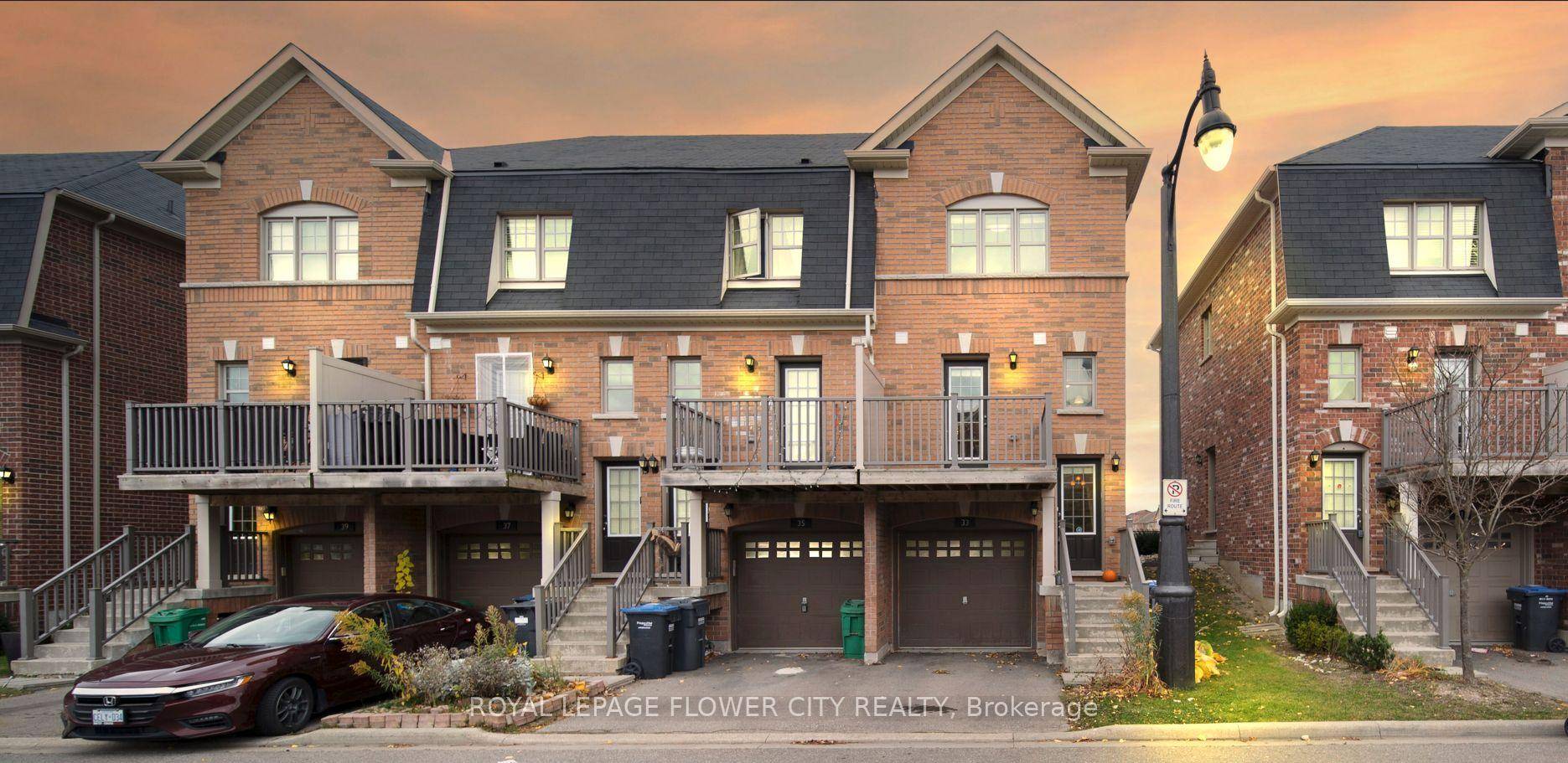RARE 3 Storey End Unit Condo Townhouse in Highly Sought After Mount Pleasant Village !
