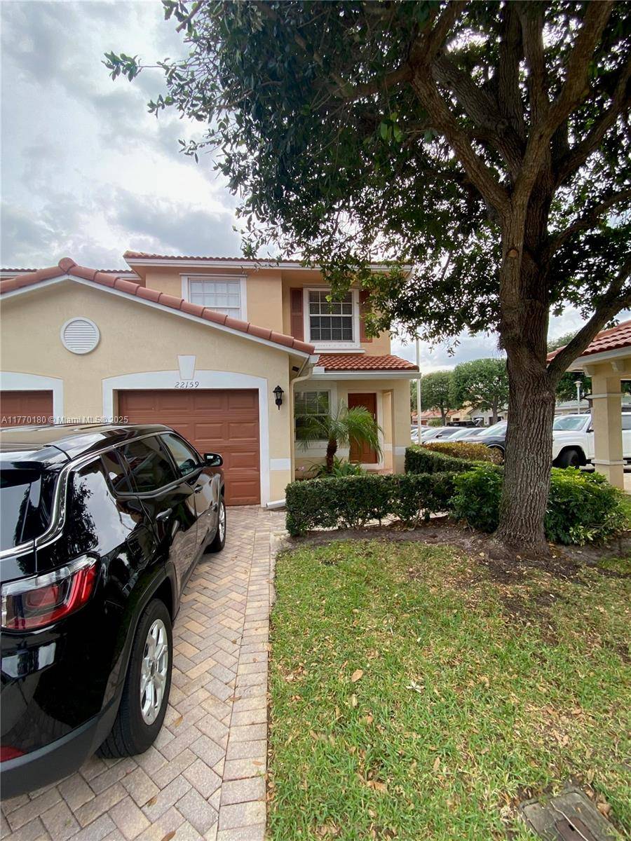 Charming Townhome at Royal Woods in luxurious Boca Raton.
