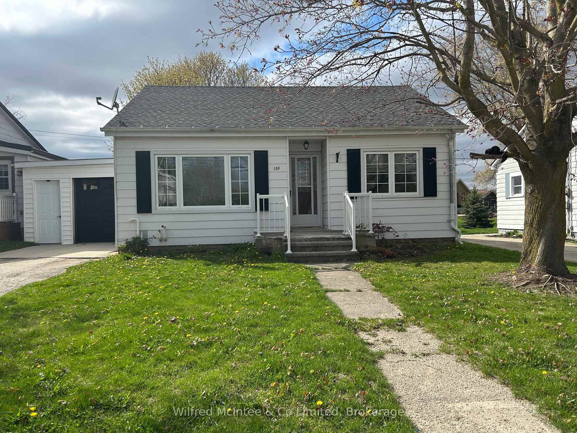 Neat and tidy 3 bedroom, 1 bath bungalow featuring an eat in kitchen, living room, and convenient main floor laundry.