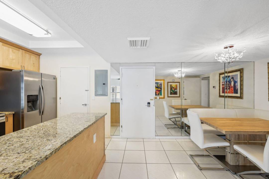 Renovated Beachfront Rental in Palm Beach with Stunning Intracoastal Views Light Bright 2 Bedroom 2 Bathroom Condo Featuring an Open Kitchen, Impact Windows Doors, Spacious Primary Suite w Walk In ...