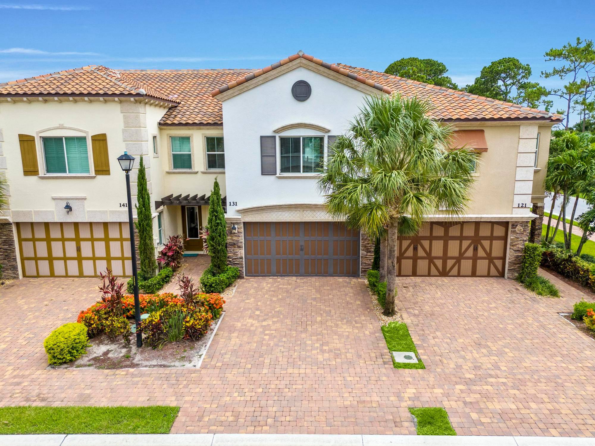 Welcome to 131 Sword Fern Place, a luxurious 3 bed, 3 bath townhome in Wellington's Binks Pointe.