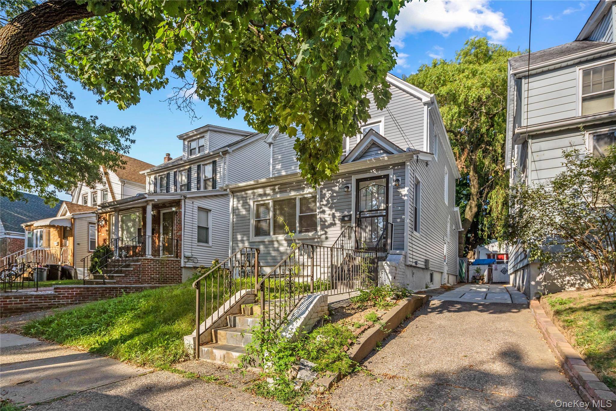 Beautifully renovated two family home located in the heart of Bayside Oakland Gardens.