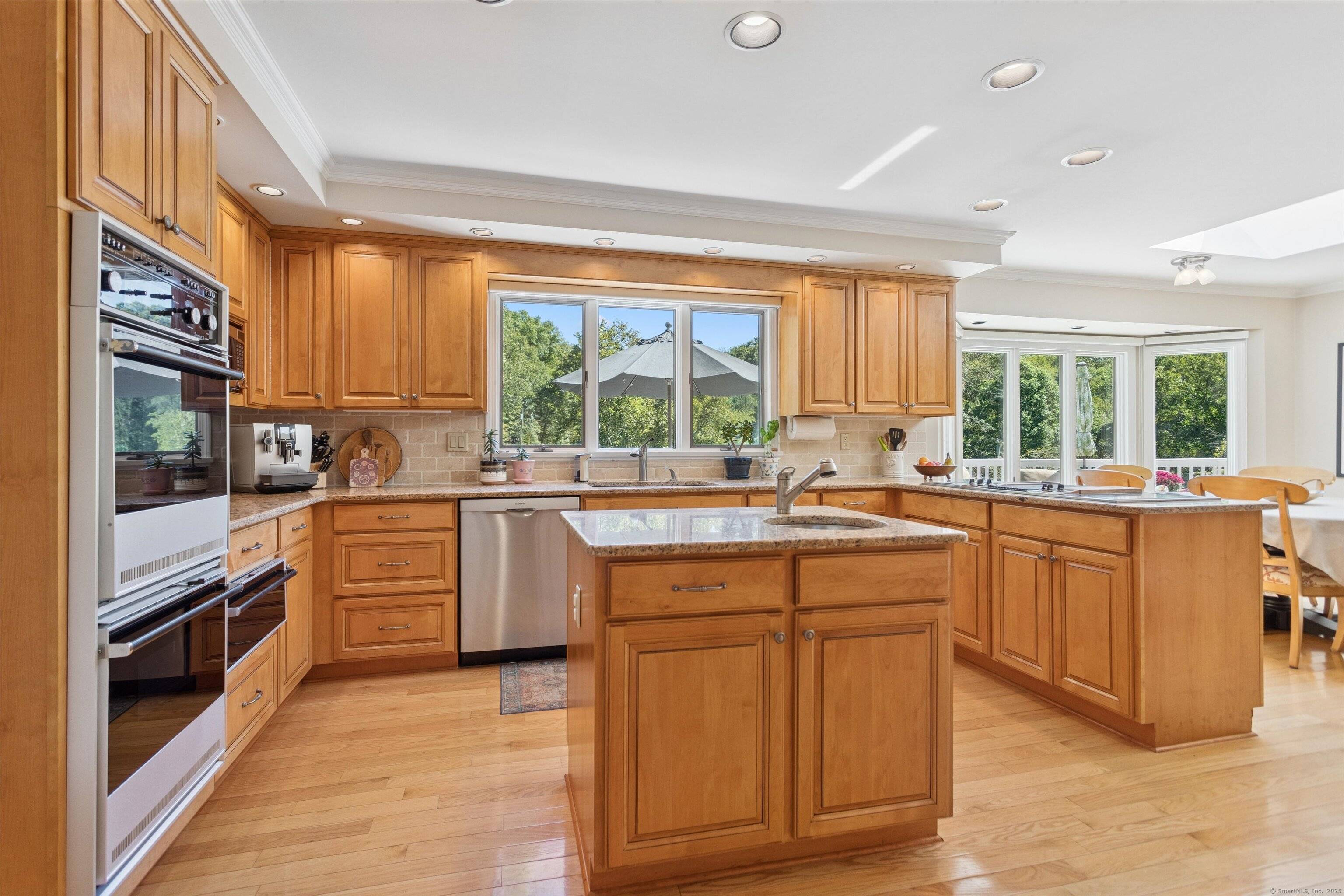 Tucked into the woods of North Stamford this custom designed 2 story ranch is the epitome of sophistication, luxury and comfort on 2 plus peaceful acres on a cul de ...