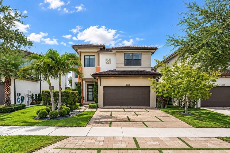 Enjoy lakefront living in the desirable Satori community of Miami Lakes.