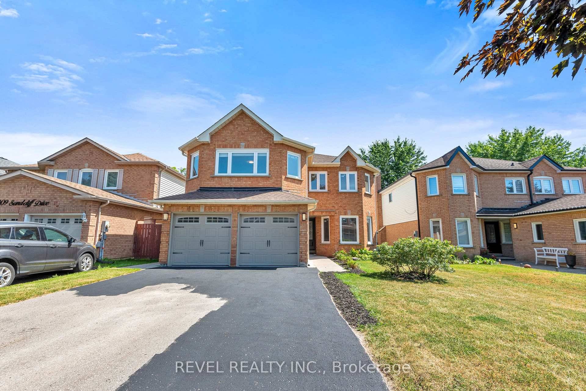 Welcome to 1005 Sandcliff Drive in Oshawa, a spacious and beautifully maintained home offering versatility, comfort, and style for growing families or multi generational living.