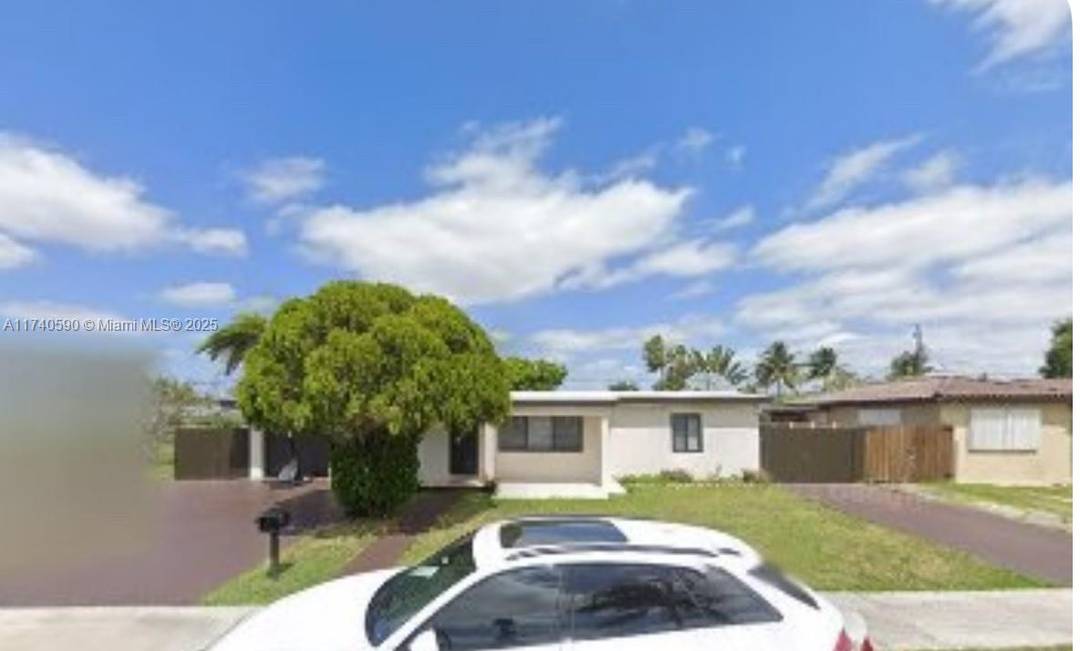 Discover this stunning 4 bedroom, 3 bathroom single family home including a private entrance 1 1 with its own kitchenette.