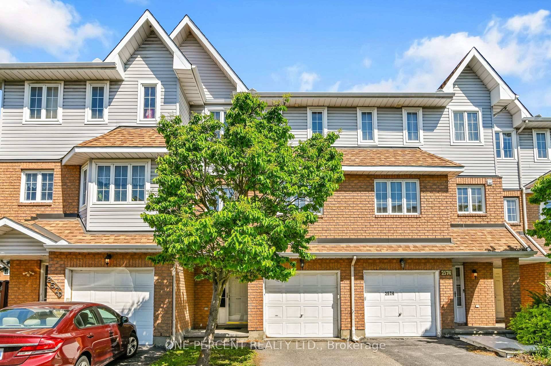 Beautifully maintained three storey townhome located on a quiet, private street in the highly desirable community of Emerald Woods.