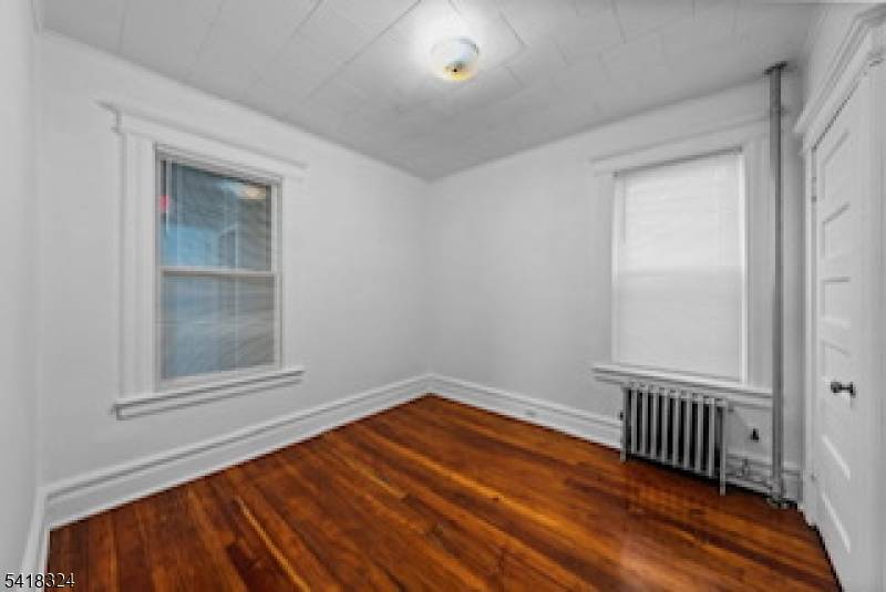 This three family home offers excellent potential for both investors and owner occupants.