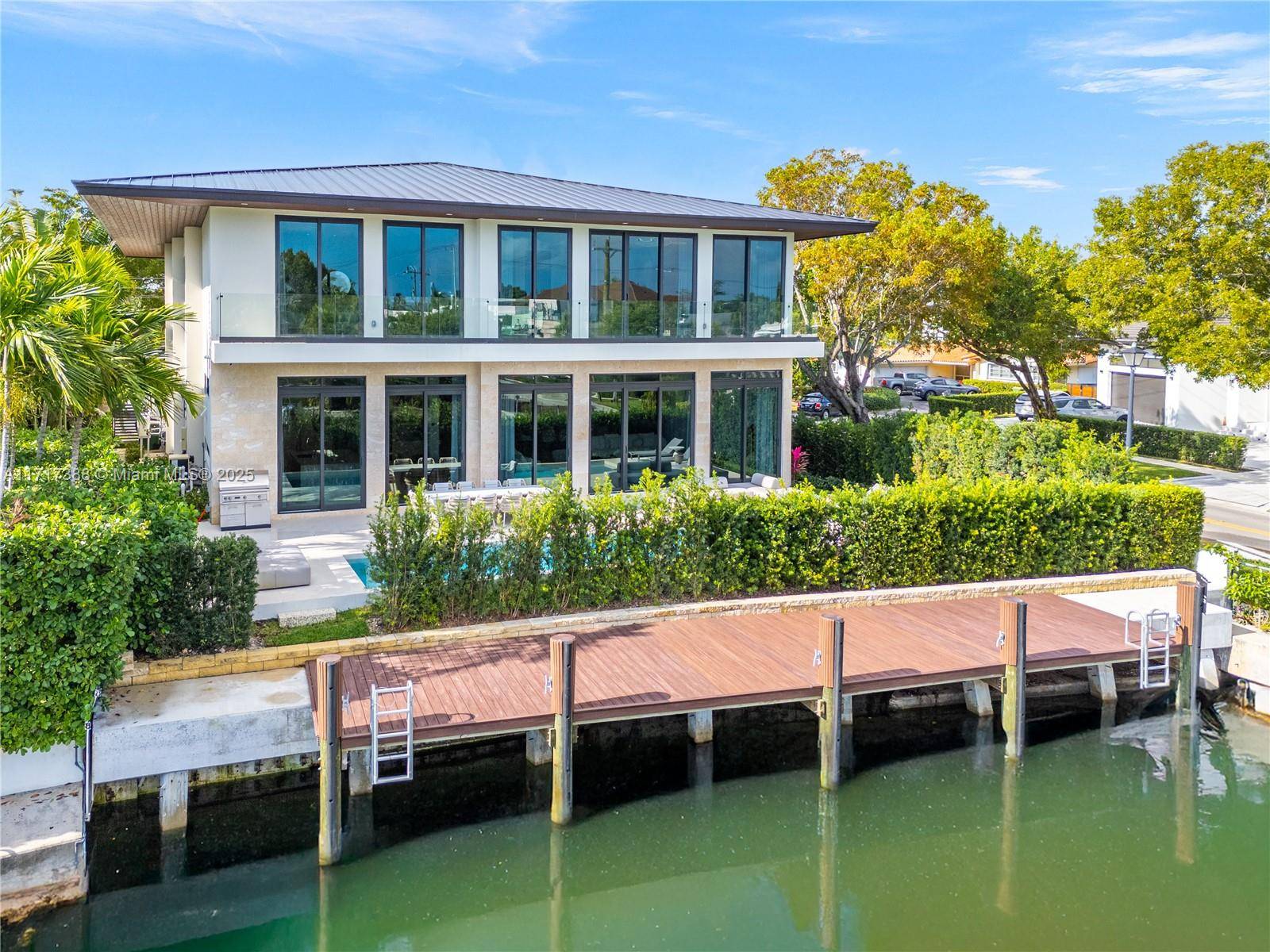 Sophisticated contemporary waterfront in exclusive and guard gated Keystone Point !