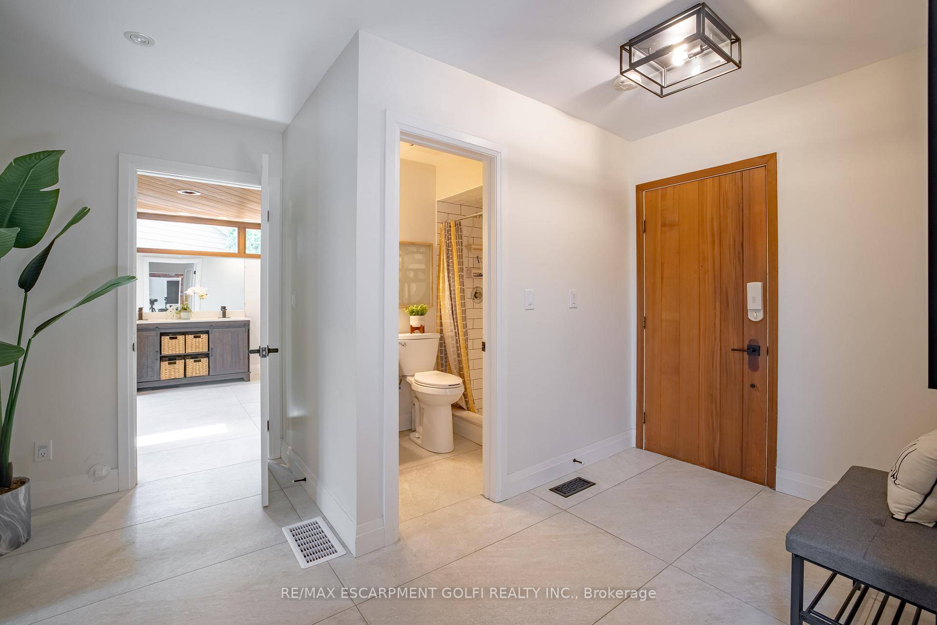 Welcome to your dream home on Riverview Blvd a masterful blend of mid century modern design and contemporary luxury.