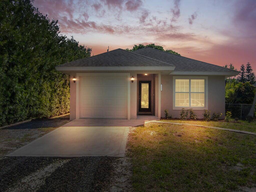 Cleverly and attractively designed 3 2 SPLIT PLAN home with VAULTED CEILINGS, tiled floors in common areas.