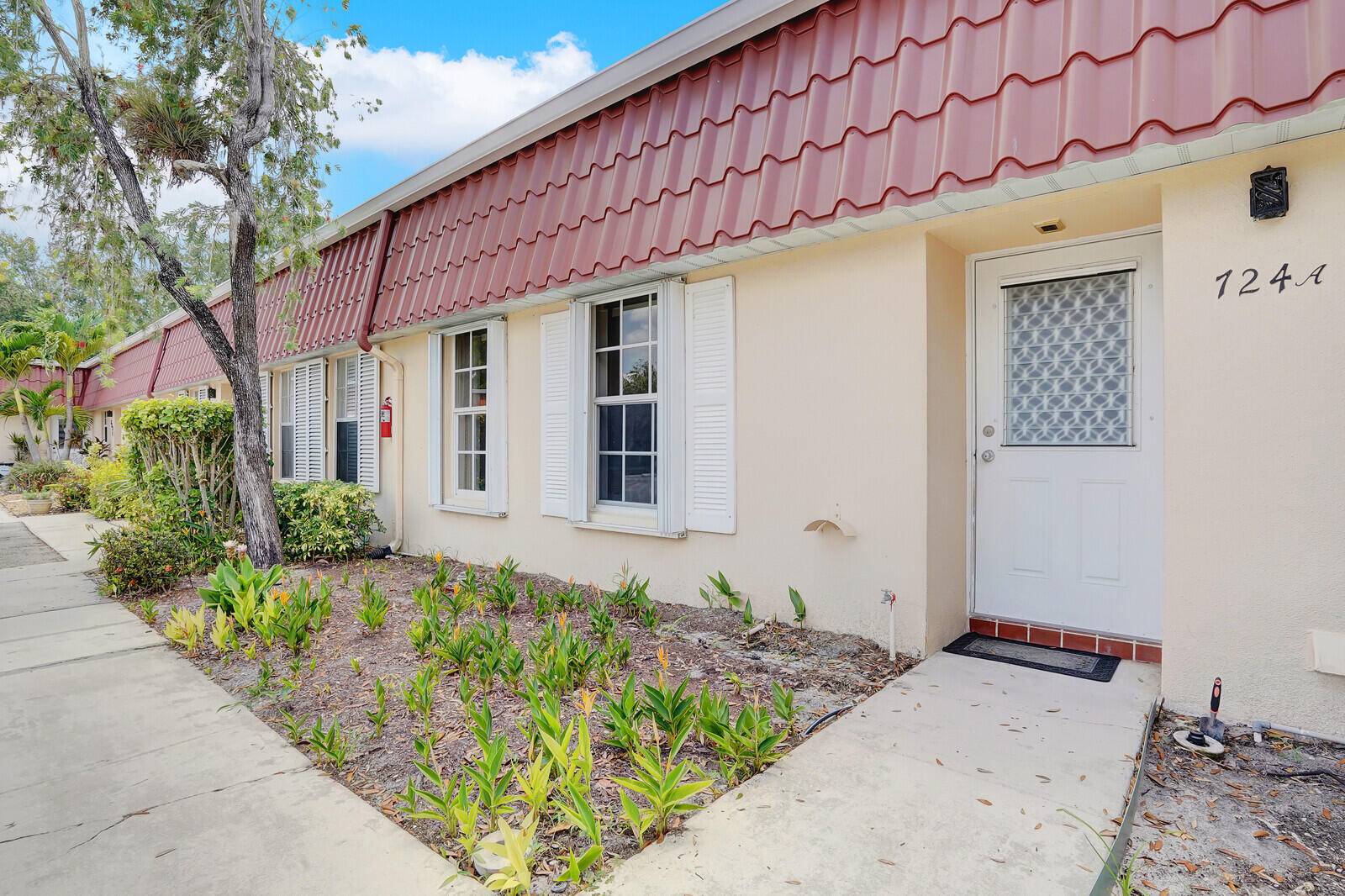 Welcome to this light and bright waterfront condo at 724 A Nantucket Circle, Lake Worth, FL !