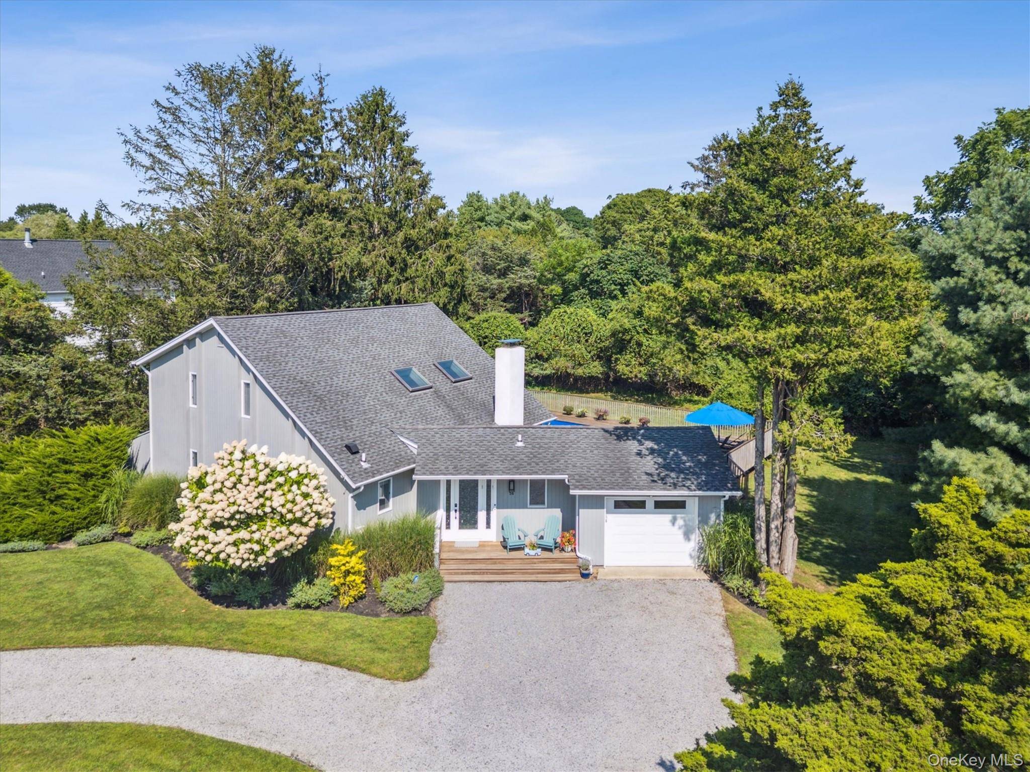 Welcome to this stunning custom contemporary home in the sought after Remsenburg neighborhood, which is just minutes away from Westhampton Beach Village Main Street.