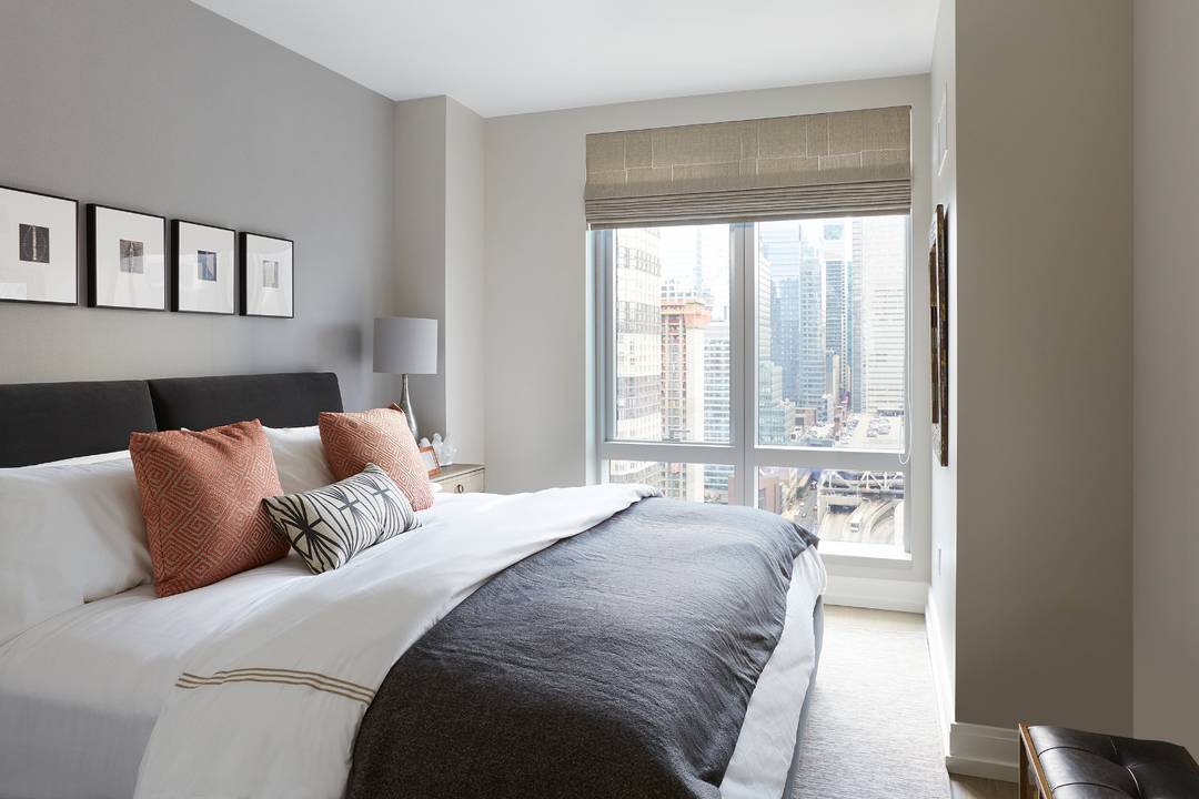 With sweeping views of the city from sunrise to sunset 555TEN towers over the new West Side.