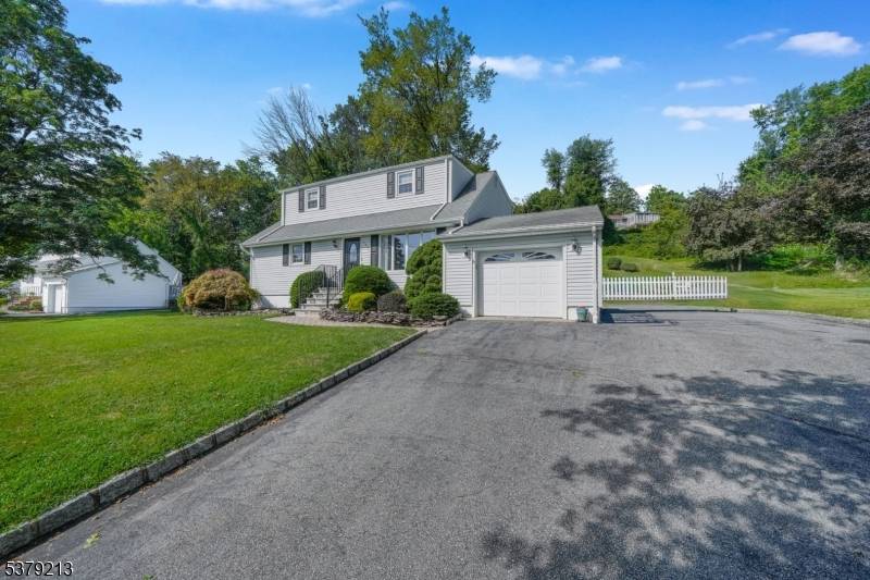 Welcome to this beautifully maintained home featuring hardwood floors and elegant crown molding throughout.