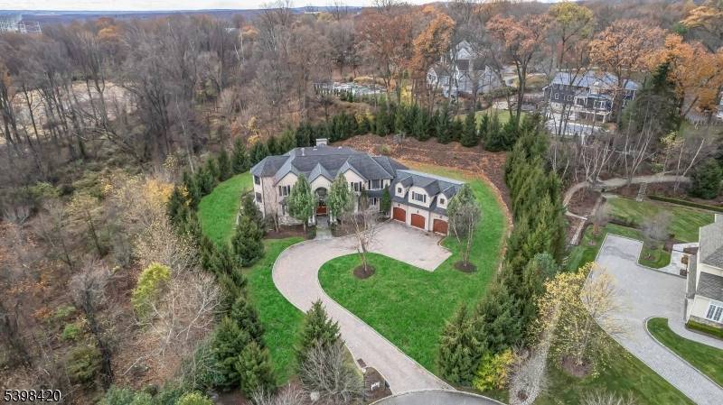 CUSTOM BUILT HOME LOCATED ON OVER AN ACRE OF PICTURESQUE PROPERTY ON A CUL DE SAC.