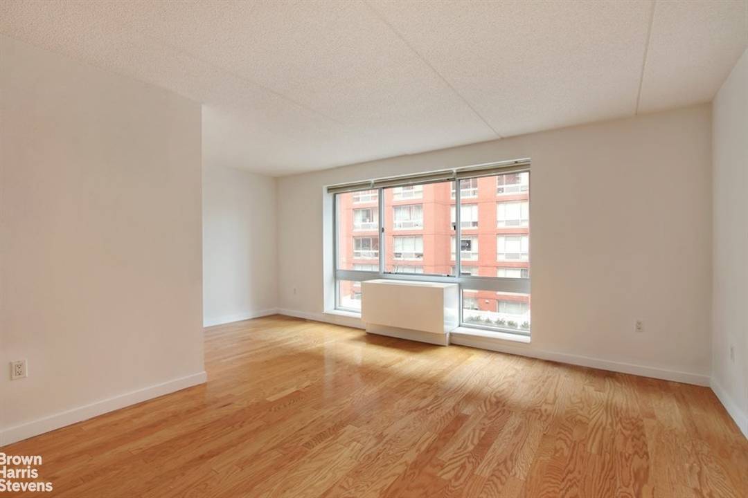 This rarely available, move in ready, sunny, south facing, spacious alcove studio is located in one of West Chelsea's most desirable full service condominiums.