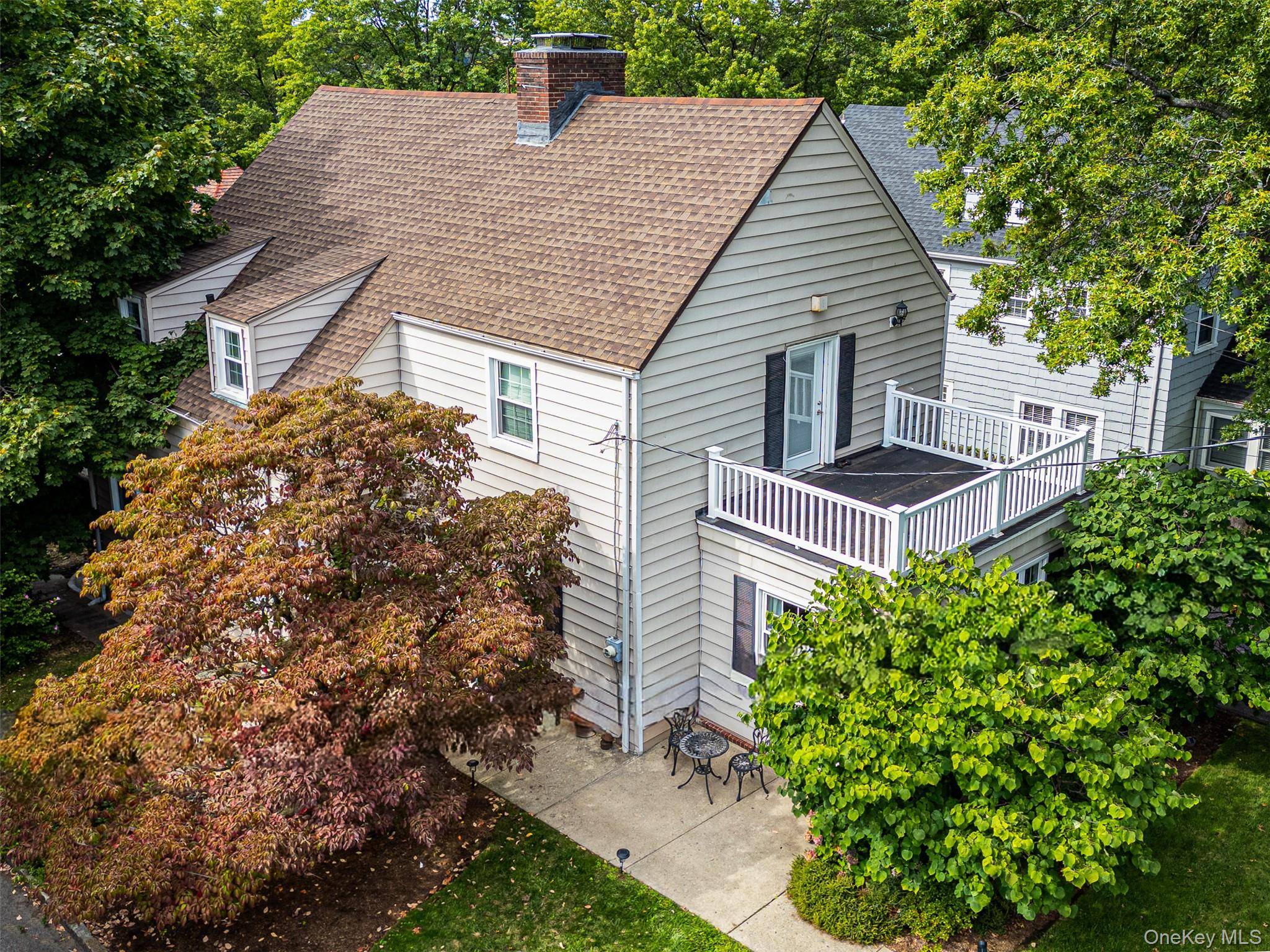 Located on a quiet, tree lined street in the village of Pelham Manor, this 3 bedroom, 3 bath home combines charm with modern comforts.