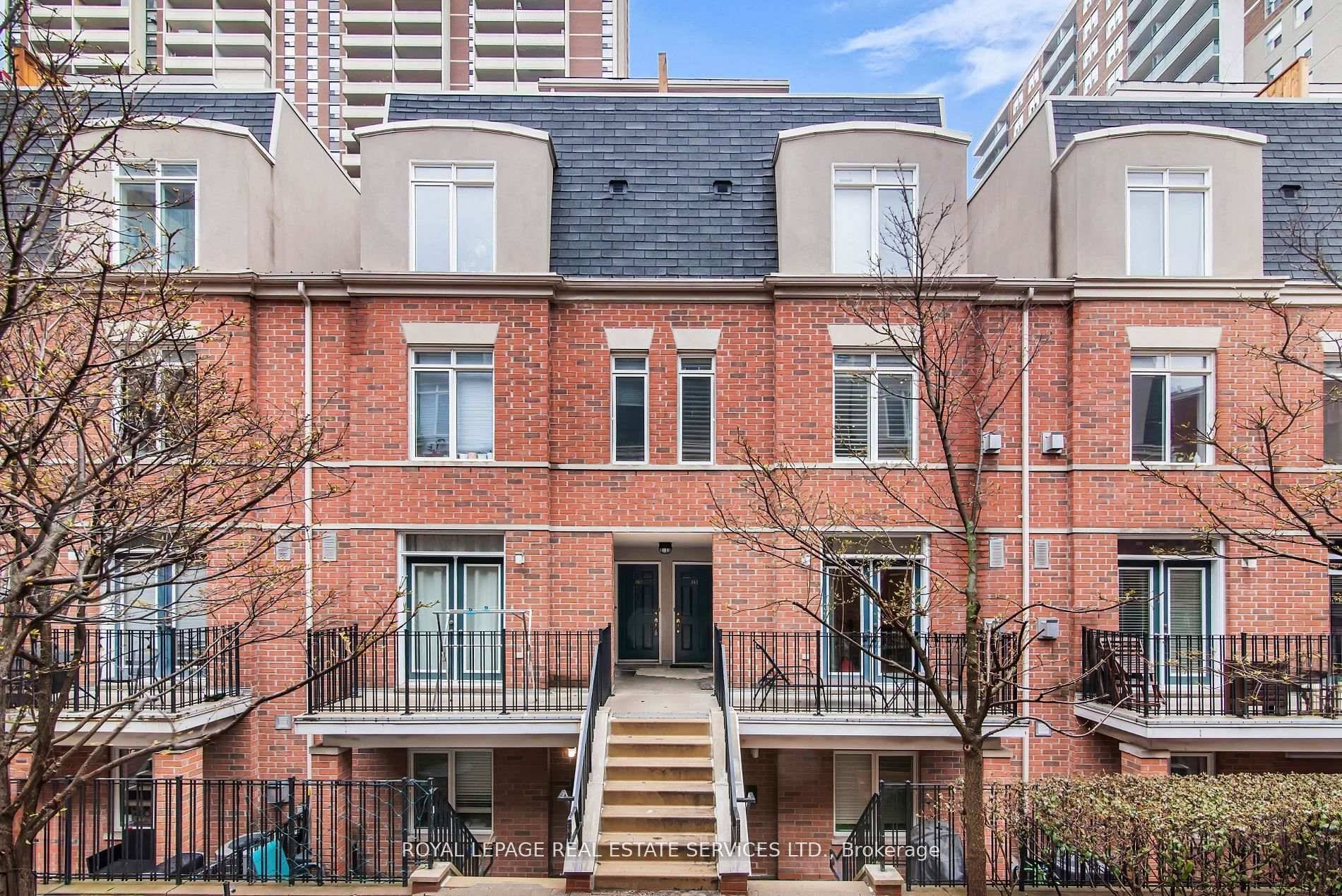 The Central Is A Charming Community Of Brownstone Walk Up Townhouse Condos In Cabbagetown, Around The Corner From Tranquil Allan Gardens.