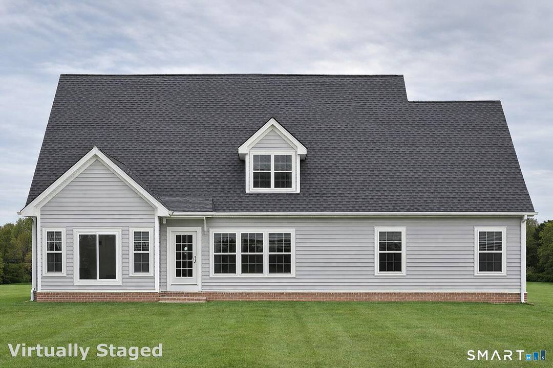 Nestled in the heart of Huntington Center, this exceptional new construction home offers a rare opportunity to own a custom built residence set on 1.