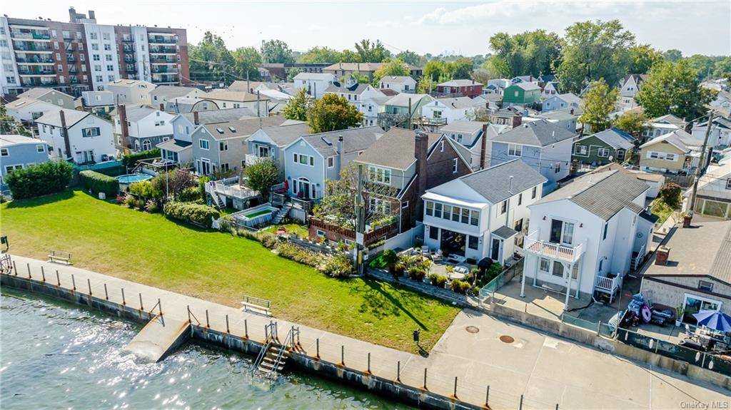 Nestled along the scenic Long Island Sound, this waterfront retreat effortlessly marries sophistication with relaxed coastal living.