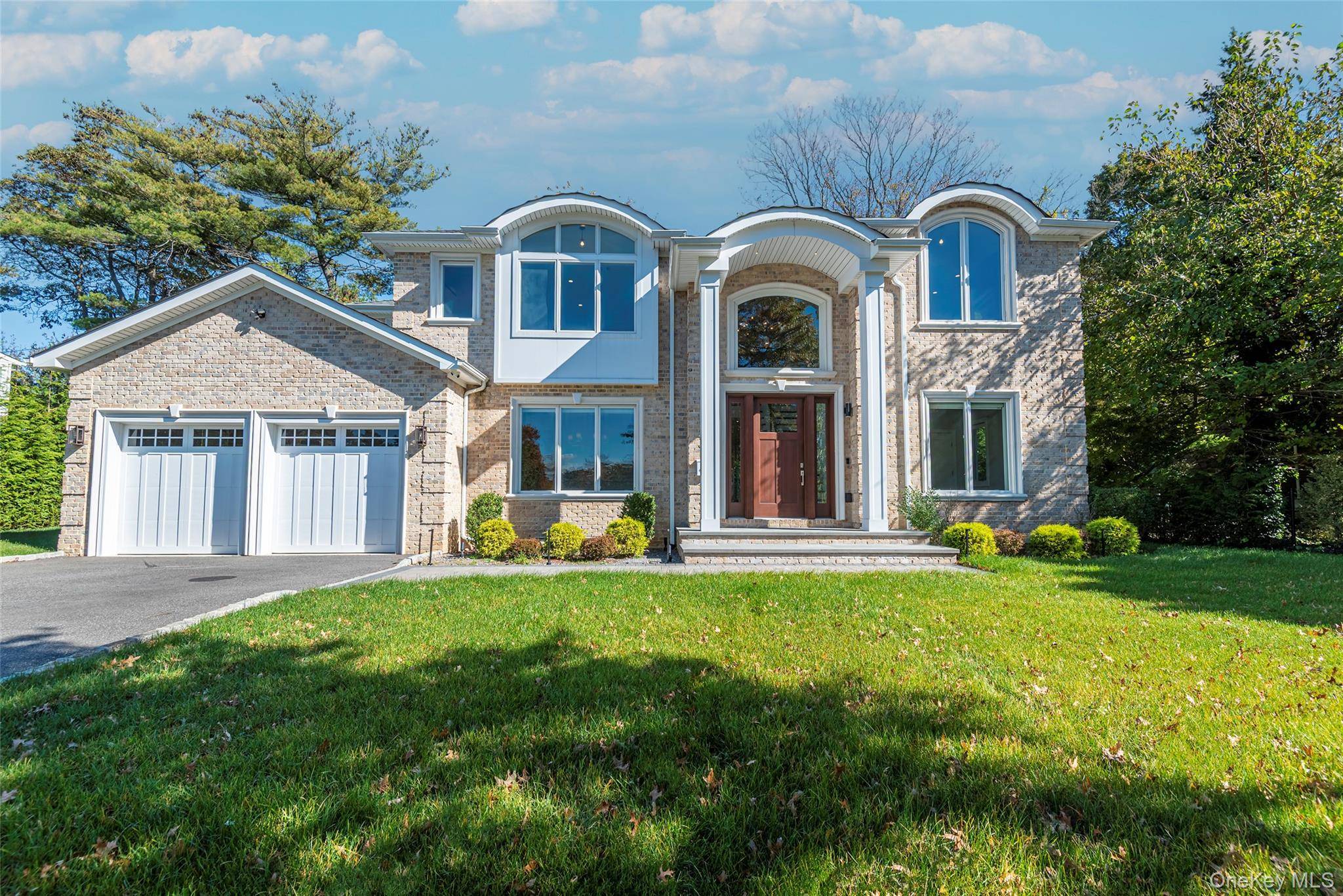 Discover elegance and modern living in this distinguished brick Colonial built in 2020, on an expansive 10, 925 sqft lot.