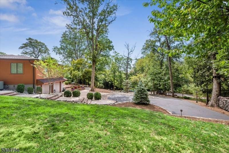 Welcome to this stunning custom ranch located in a serene mountain location with winter views in desirable Bridgewater Township.