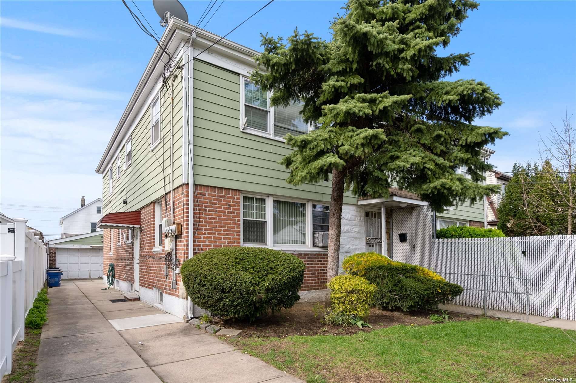 Semi detached, legal 2 family home in Springfield Gardens, 2Brs 1Bth over 2Brs 1Bth, separate dining area, large window in living room draws in lots of sunshine, private driveway with ...