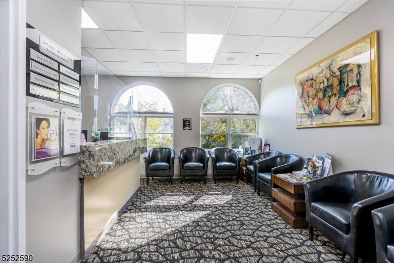 STEP INTO AN INCREDIBLE OPPORTUNITY WITH THIS AMAZING END UNIT OFFICE CONDO.