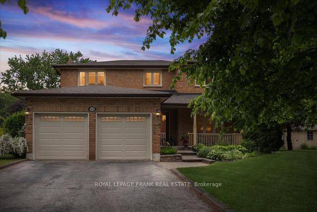 Welcome to this stunning 4 bedroom, 4 bathroom home, perfectly located on a quiet court and set on an expansive 1 3 acrelot.