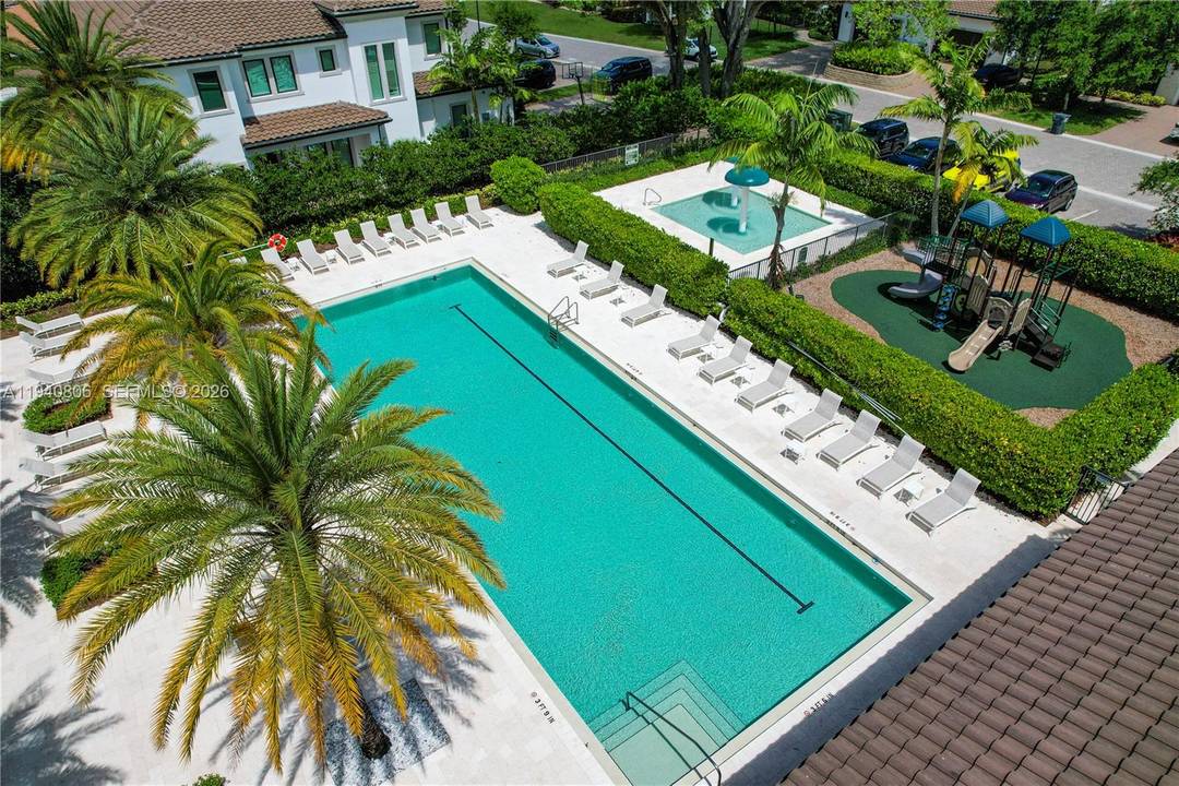 Located behind the gates of The Preserve at Emerald Hills, this beautiful residence offers a refined blend of privacy, comfort, and South Florida sophistication.