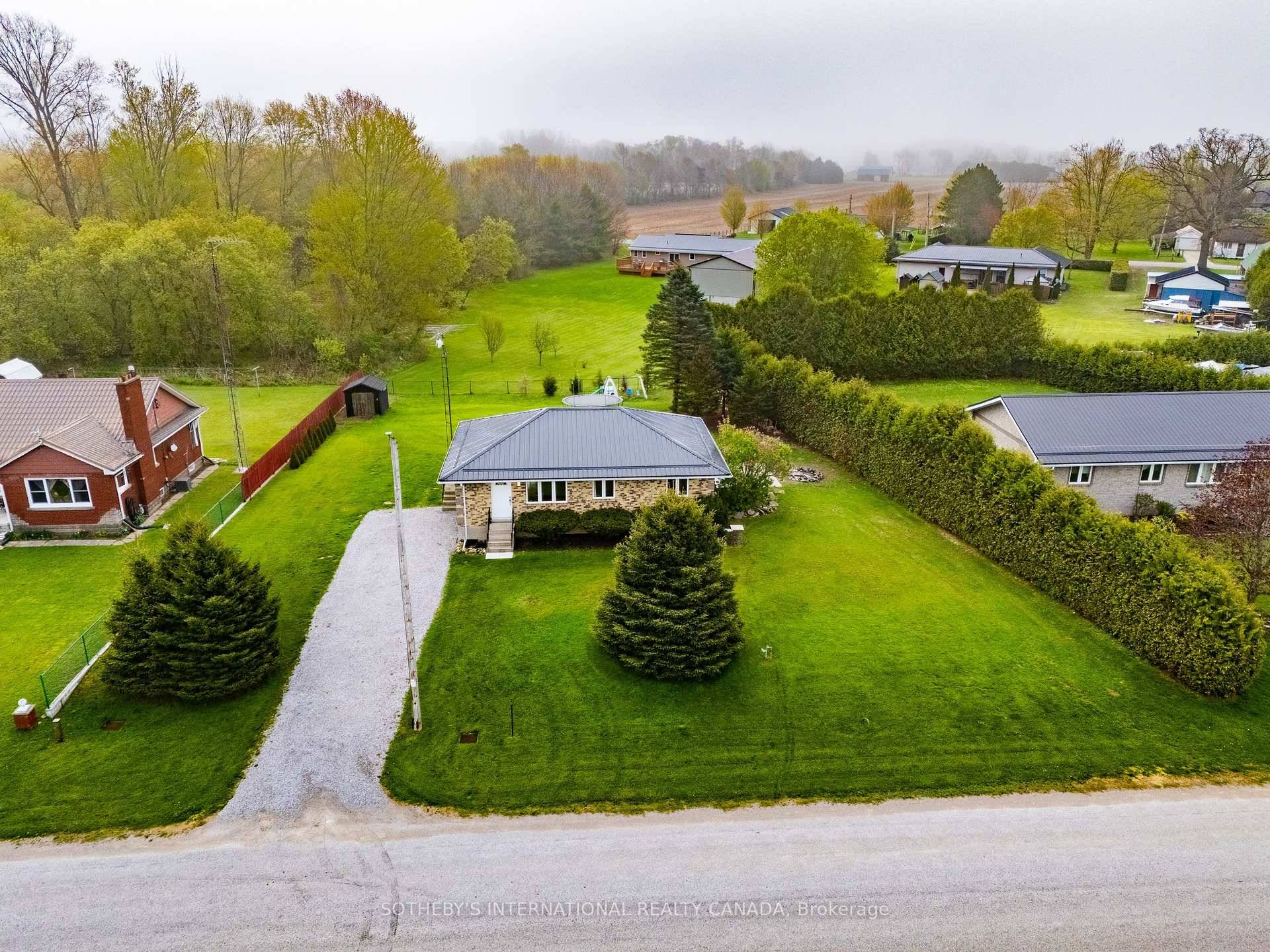 Beautiful Three Bedroom Brick Bungalow on Nearly Half an Acre Country Living at Its Best !