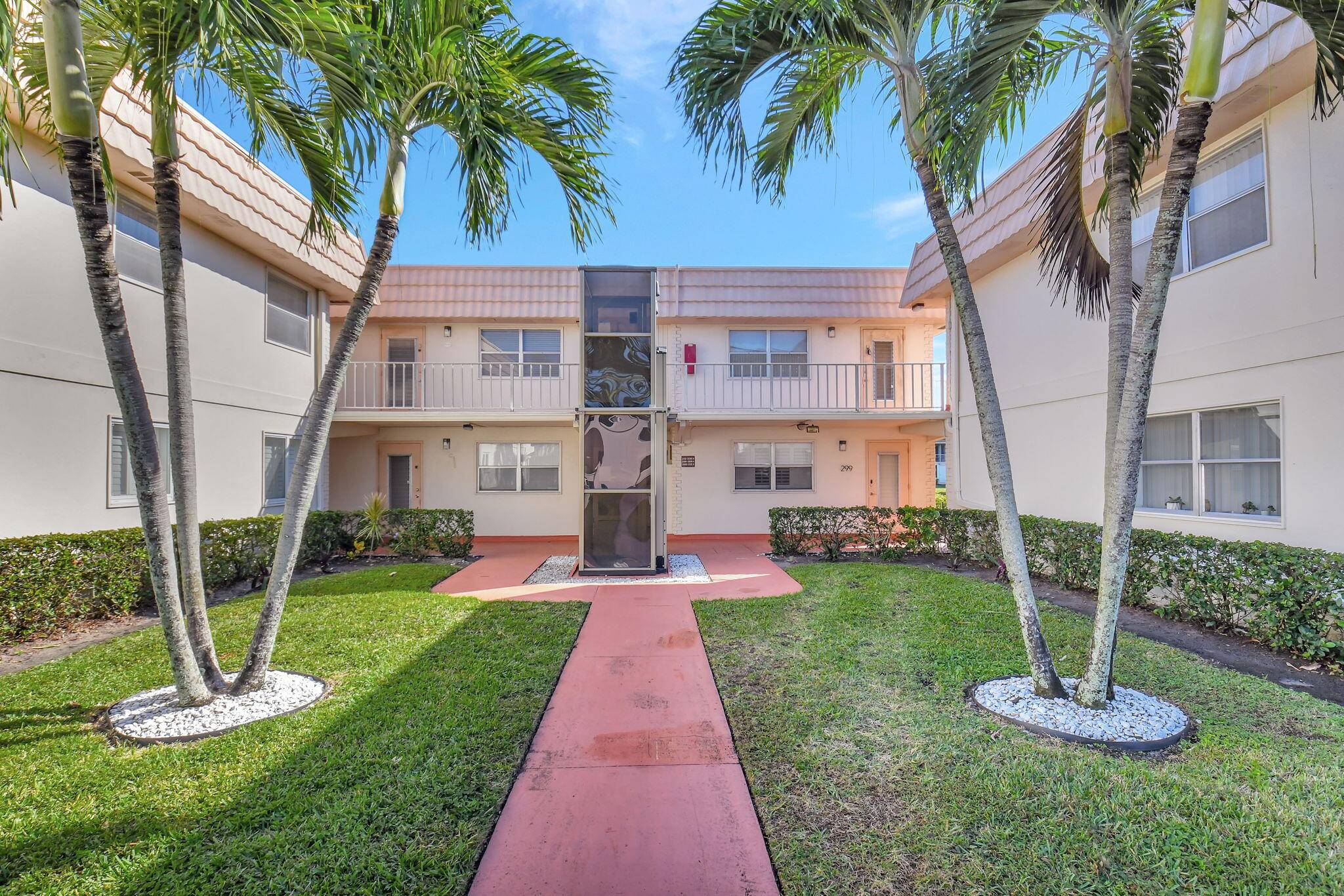 Welcome to this beautifully maintained 2nd floor condo offering stunning garden and water views from the living room.