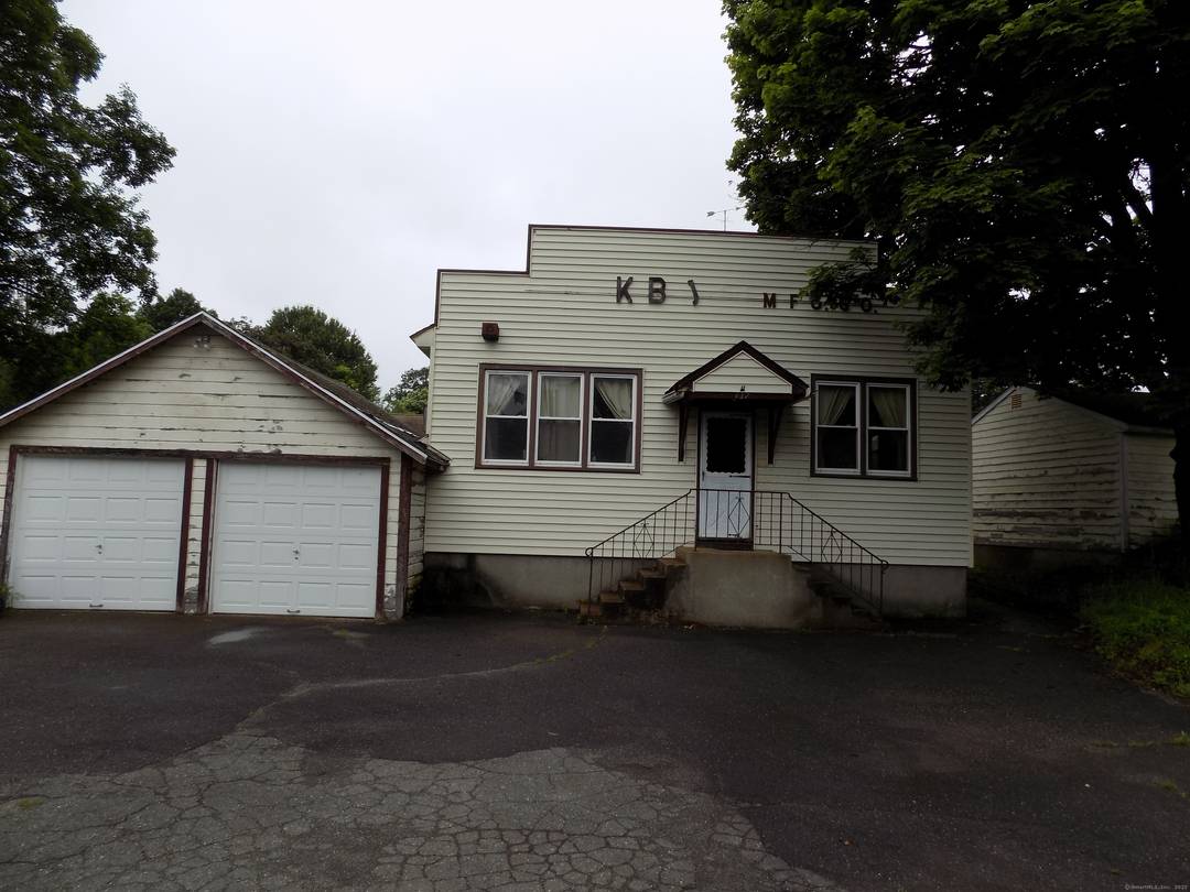 Hard to find and industrial building with a single family home for rental income.