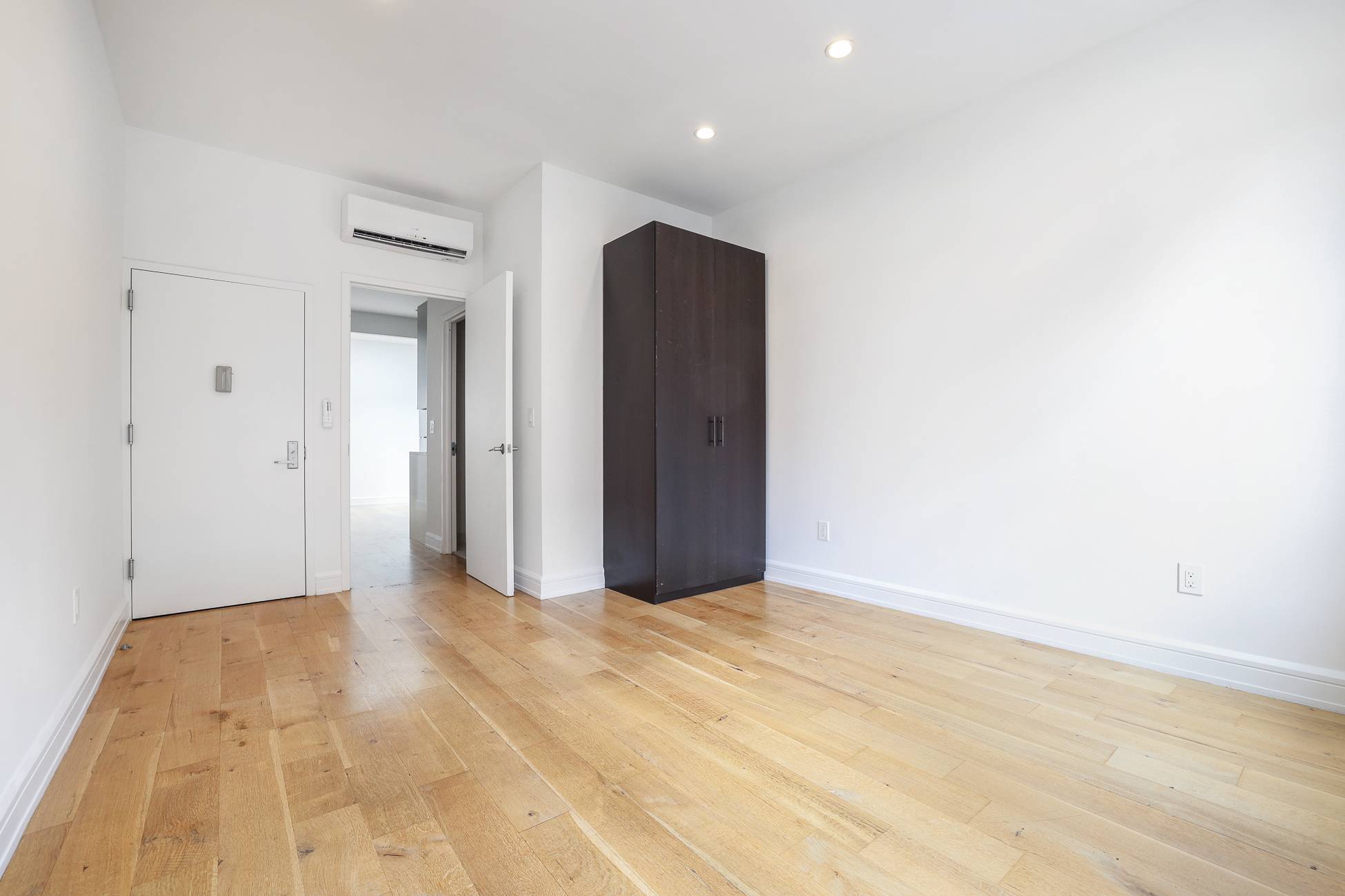 This renovated floor through 1 bedroom home is a unique find.