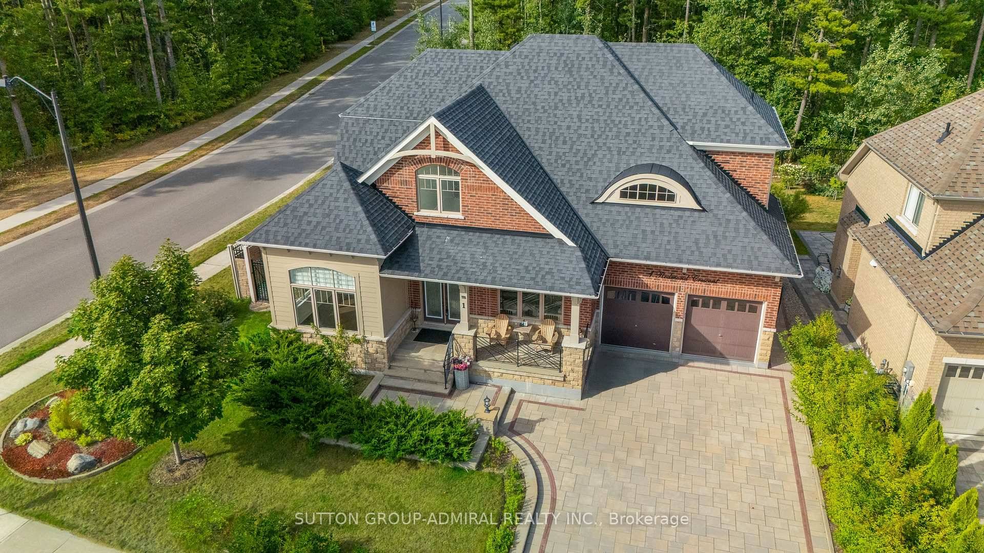 Welcome to 1 Redmond Crescent in Springwater an executive residence on a premium ravine lot backing onto mature trees.