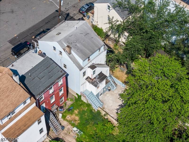 Welcome to this beautifully recently renovated three family home, situated in Paterson, NJ.