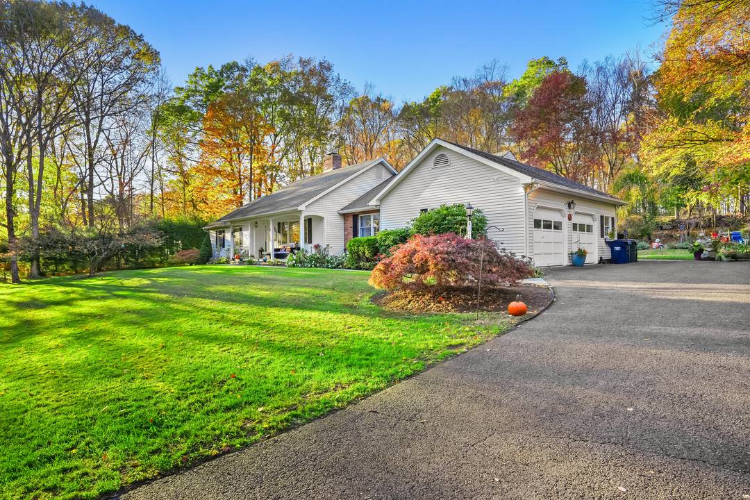 Welcome to 4 Autumn Ridge Road, a beautifully maintained ranch style home set on over two acres of peaceful, landscaped property in New Fairfield, Connecticut.