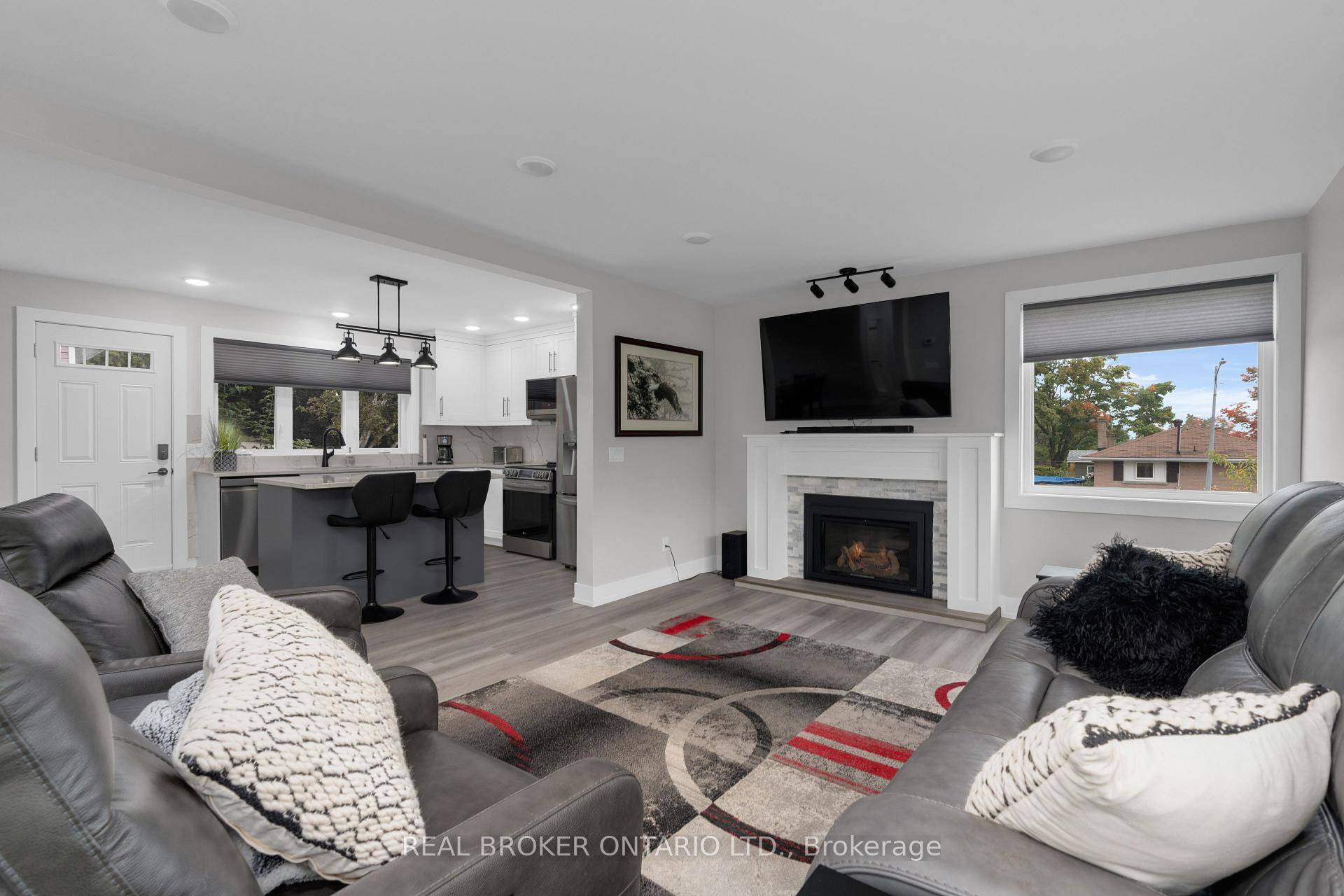 Gutted to the studs and completely renovated finished July 2024 this corner home with two driveways shows pristinely on all 3 levels !
