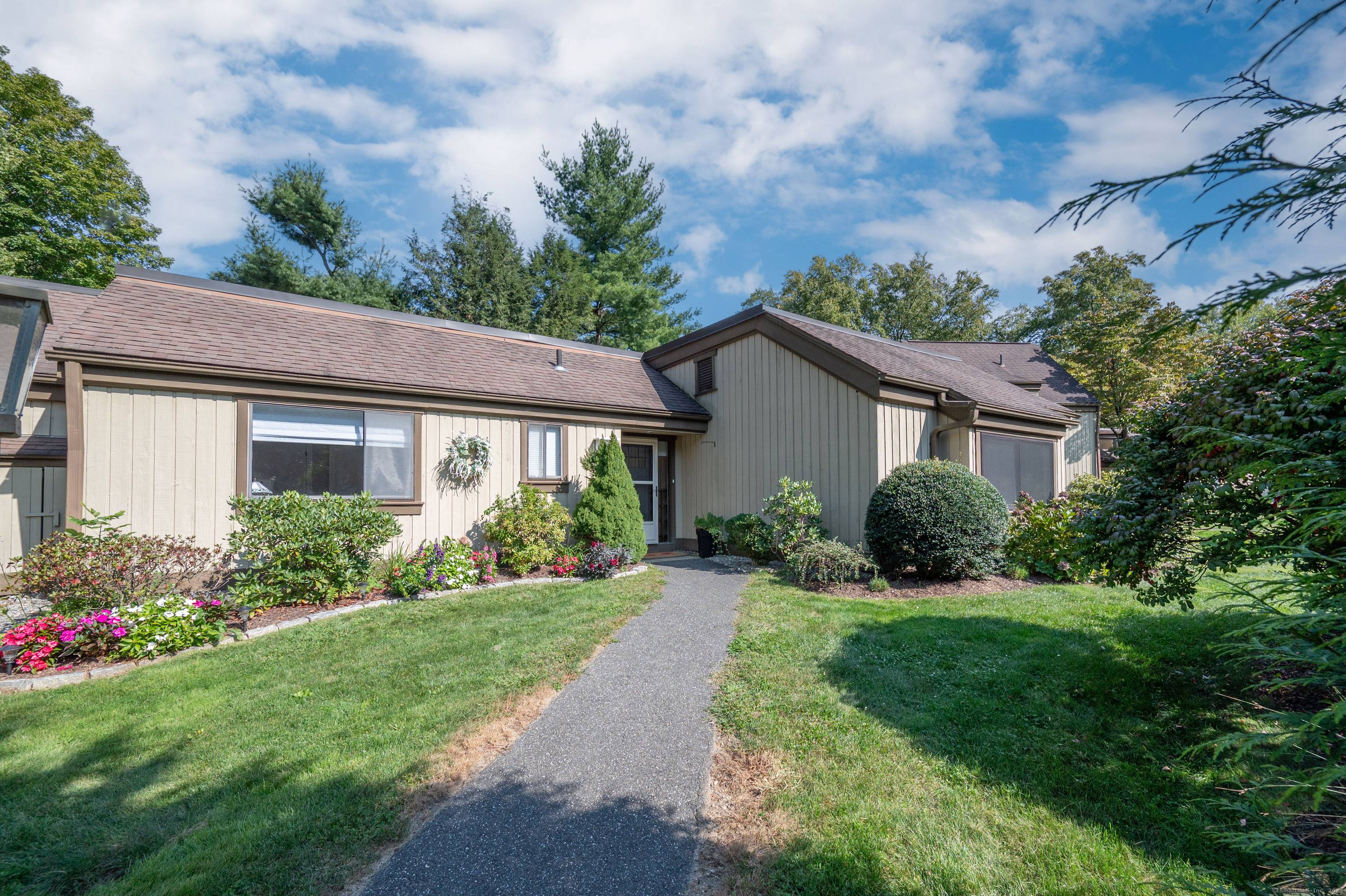 Embrace the epitome of comfort and style in this three bedroom, two bath condo, boasting the highly desirable Berkshire floor plan.